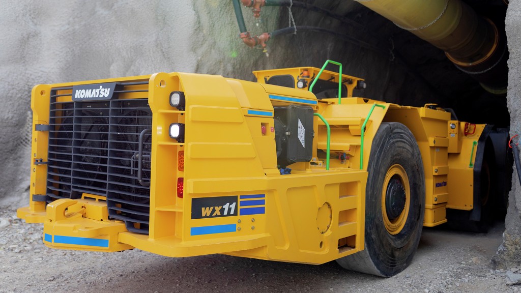 An underground load, haul, and dump (LHD) machine in a mine tunnel.