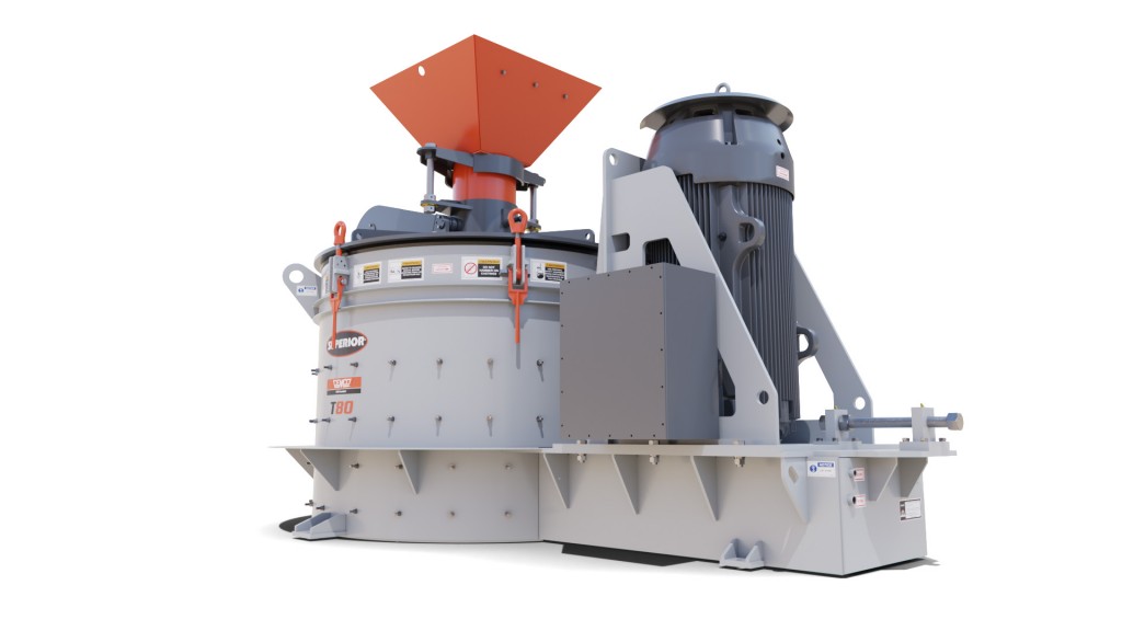 A vertical shaft impact crusher in front of a white background.