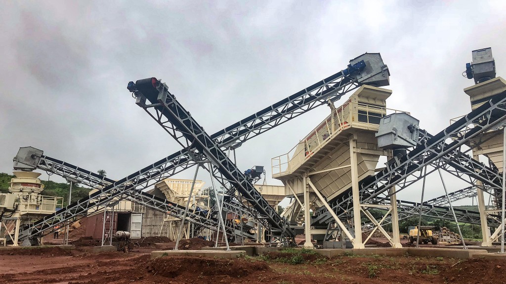 A crushing and screening plant including a variety of conveyors and aggregate stockpiles.
