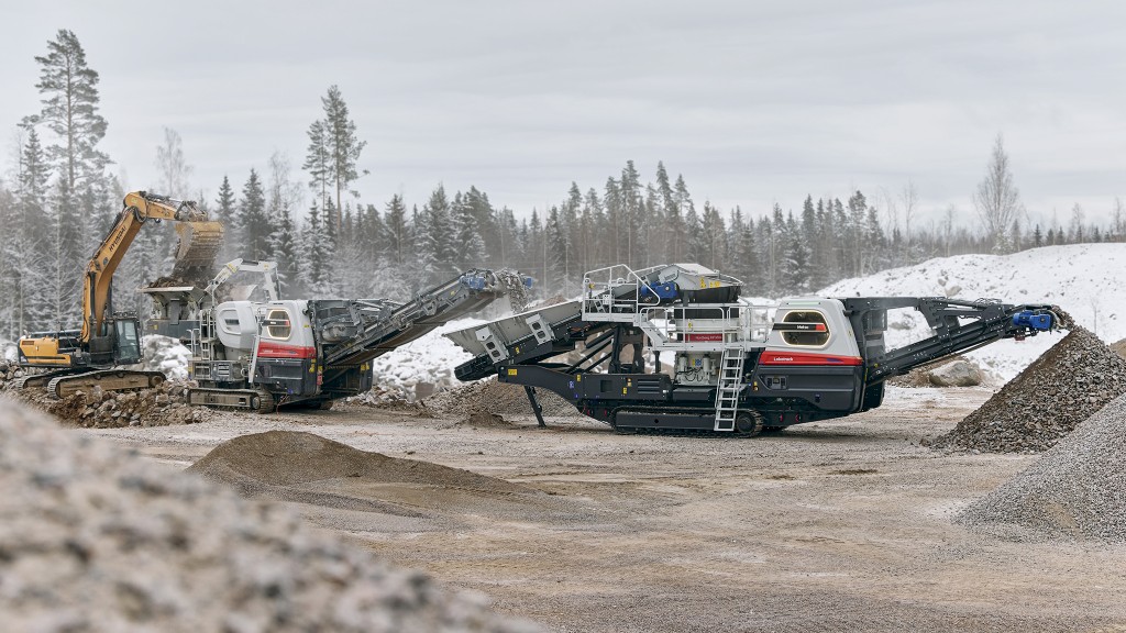 A jaw crusher and cone crusher working together in train in a quarry.