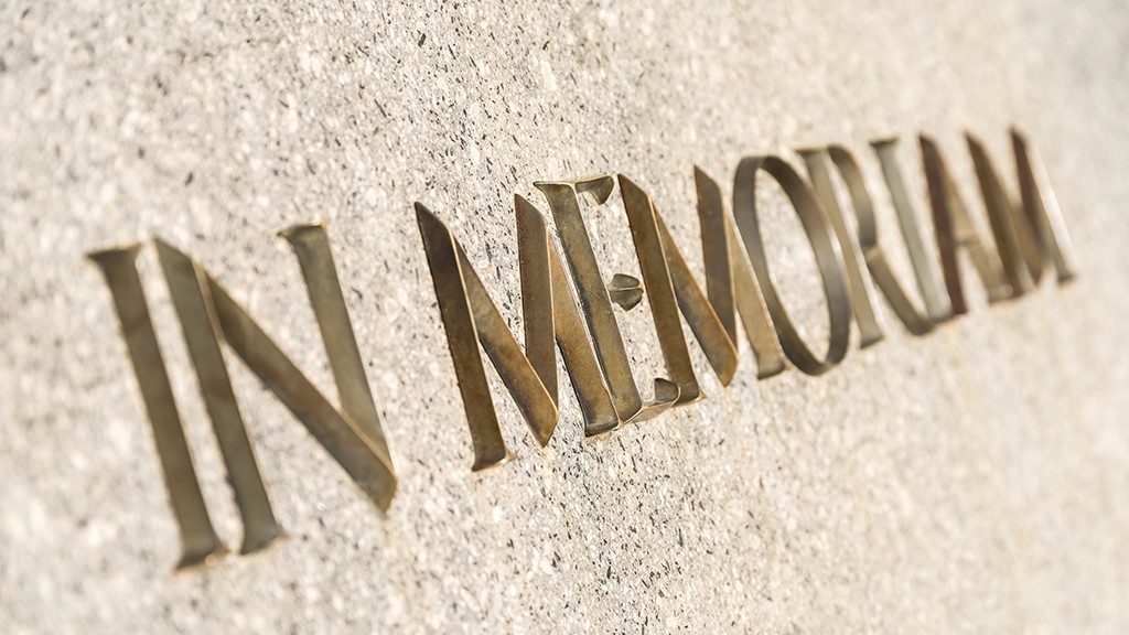 An In Memoriam plaque on a memorial stone.