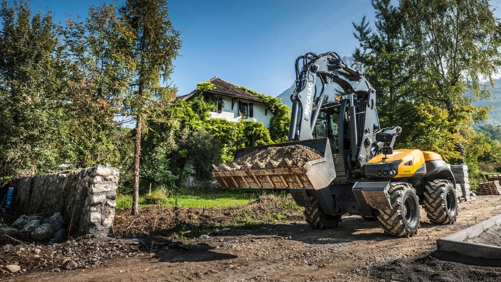 Mecalac combines a wheeled compact excavator, loader, and telehandler into one machine