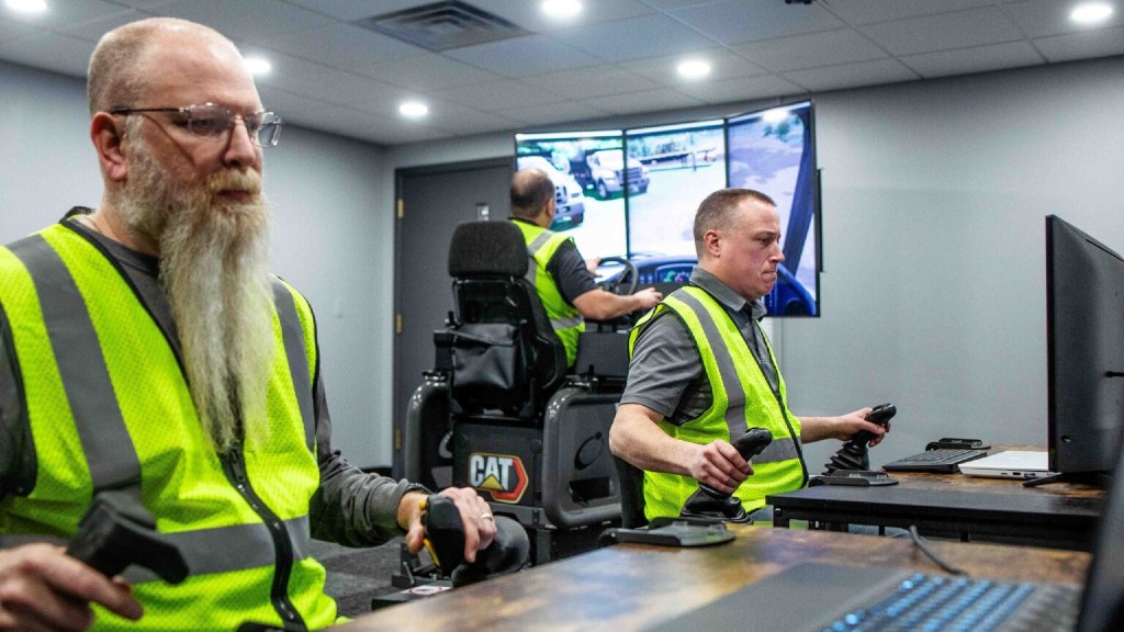 Operator trainees learn at a simulator