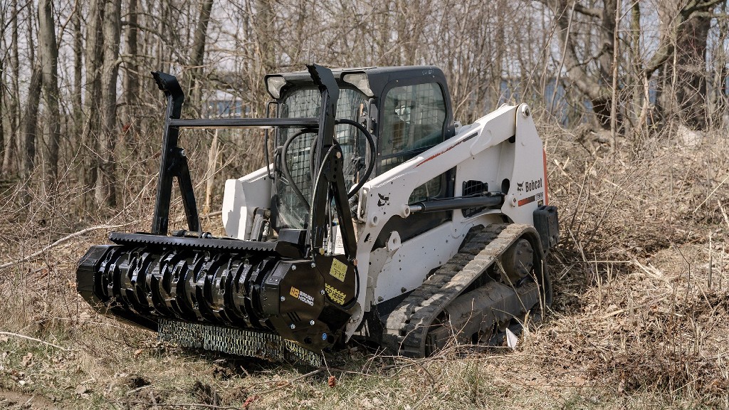 A Bobcat CTL is equipped with a forestry mulcher