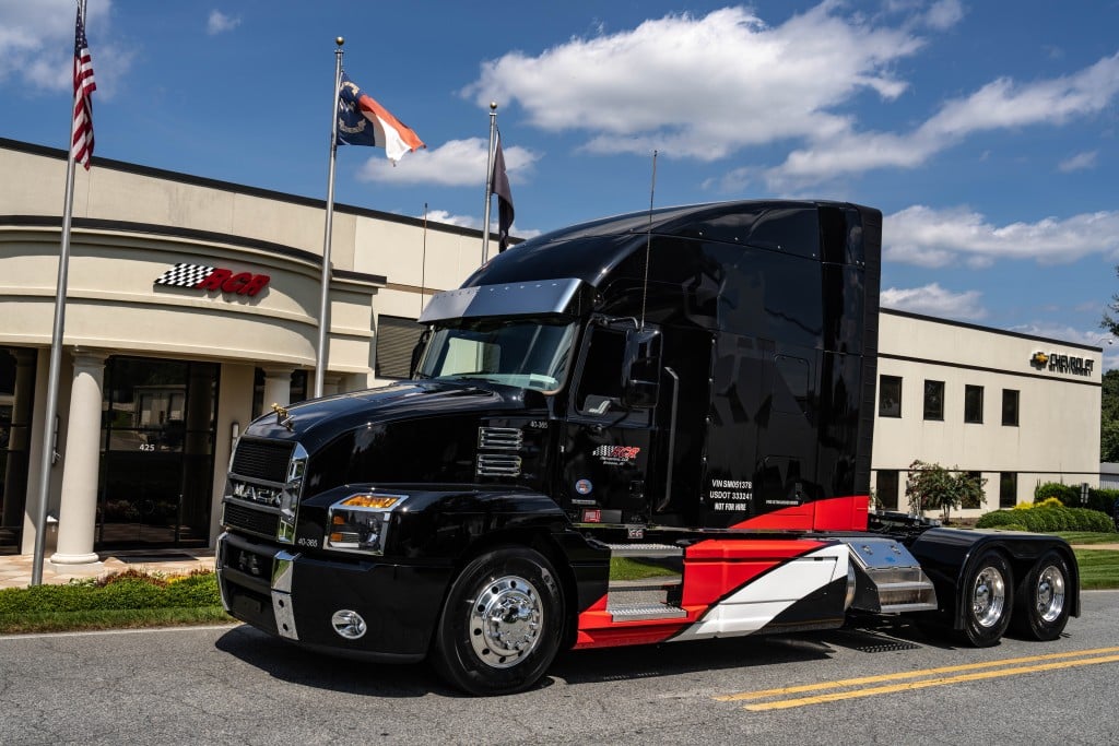 Custom Mack trucks haul race cars