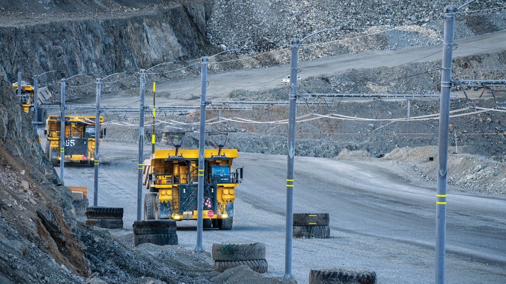 A Komatsu mining truck powered by trolley assist