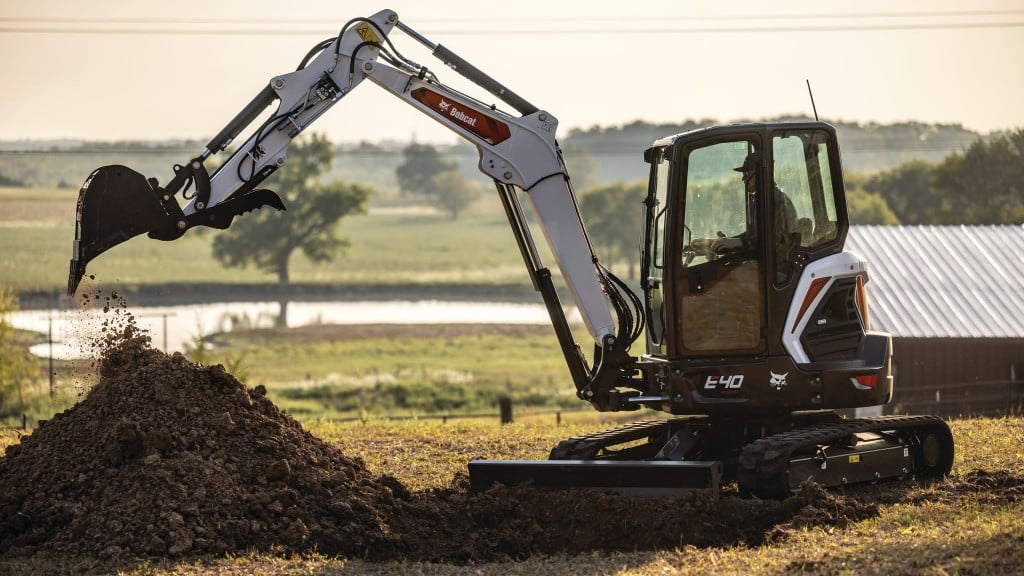 Bobcat compact excavator working in a field