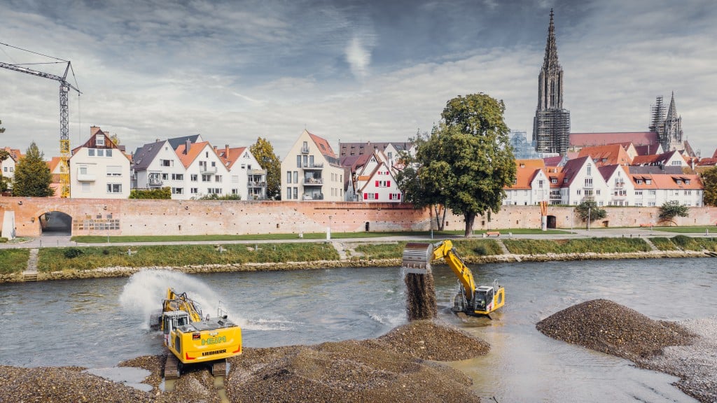 Two Liebherr excavators assist with flood prevention from the middle of the Danube