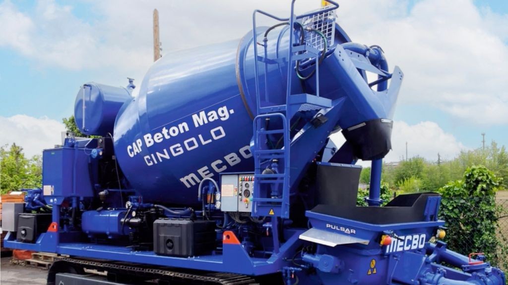 A large blue cement mixer with white letters