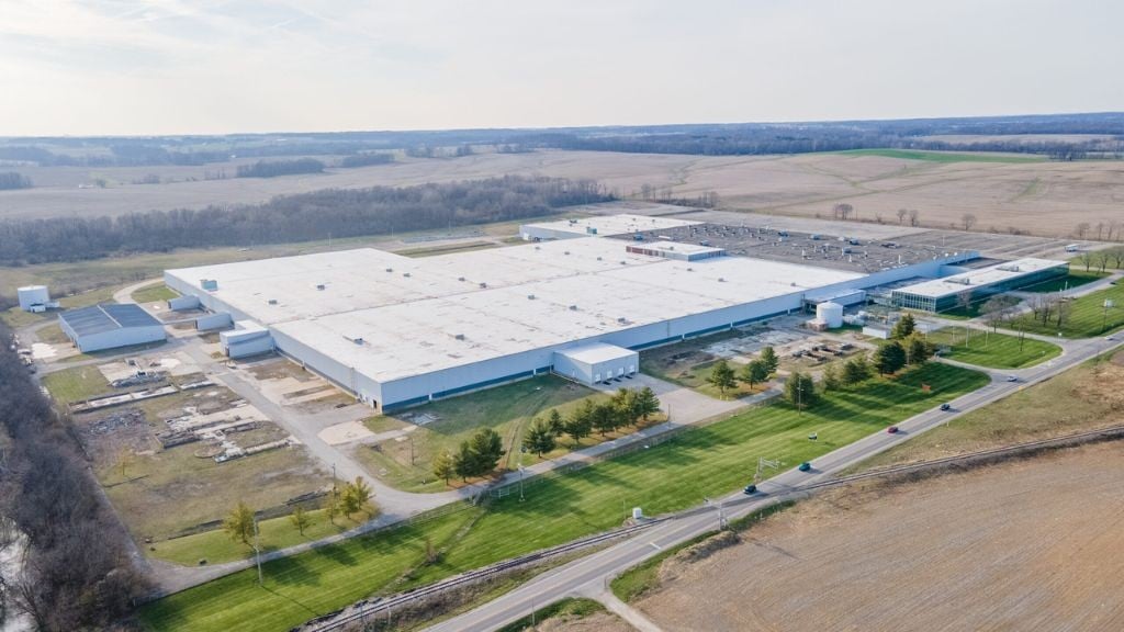 An aerial photo of a large factory or warehouse An aerial photo of a large factory or warehouse