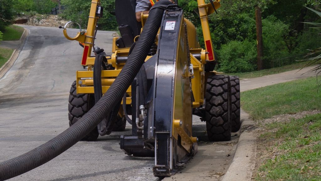 The back side of a microtrencher attachment