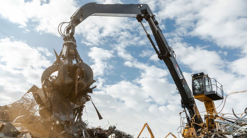 A material handler on a scrap yard