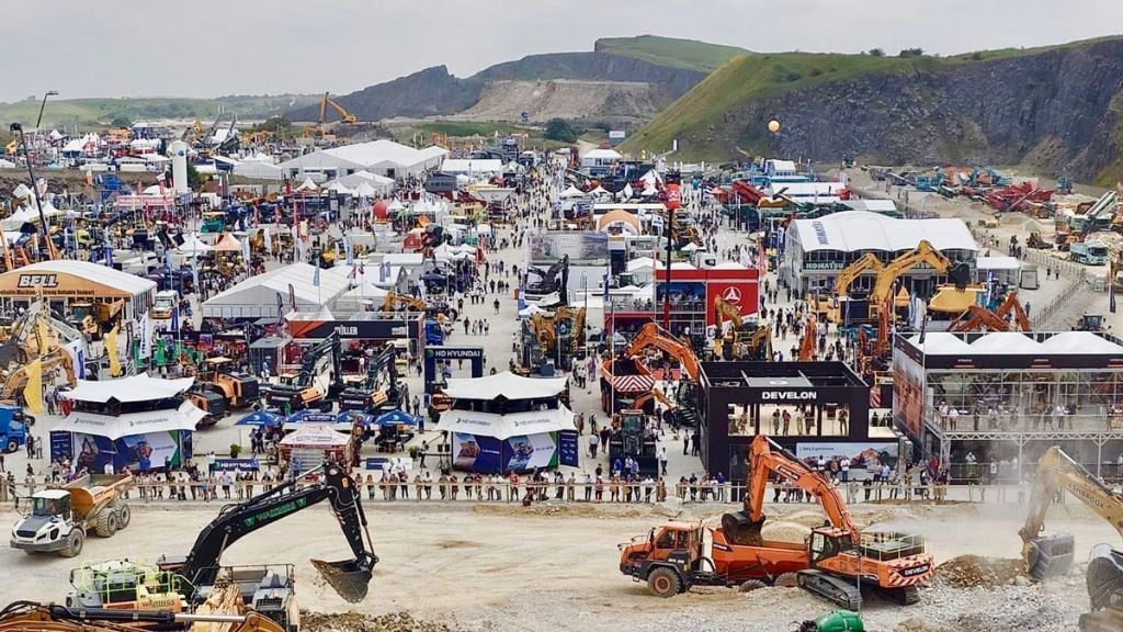 An expansive view of a large outdoor trade show area An expansive view of a large outdoor trade show area