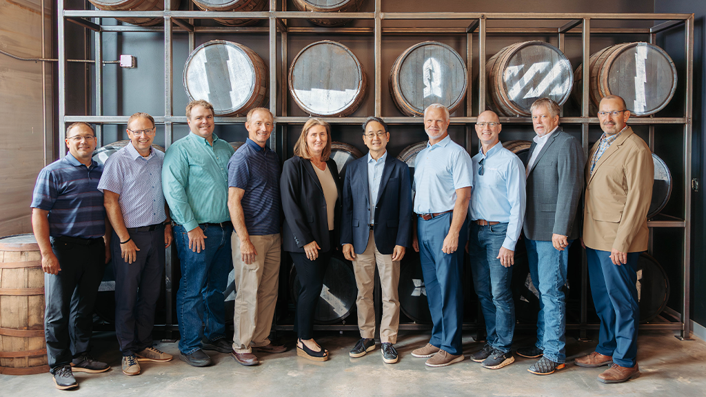 A team of people taking a group photo