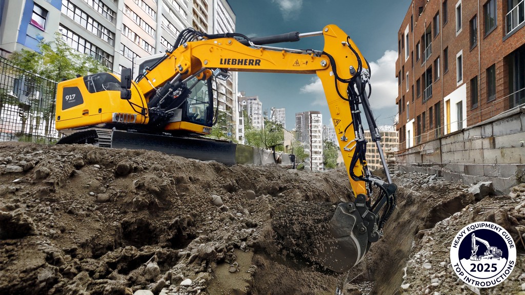 A compact crawler excavator digging into a ditch