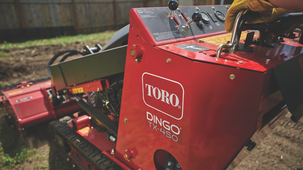 The side of a walk-behind compact utility loader