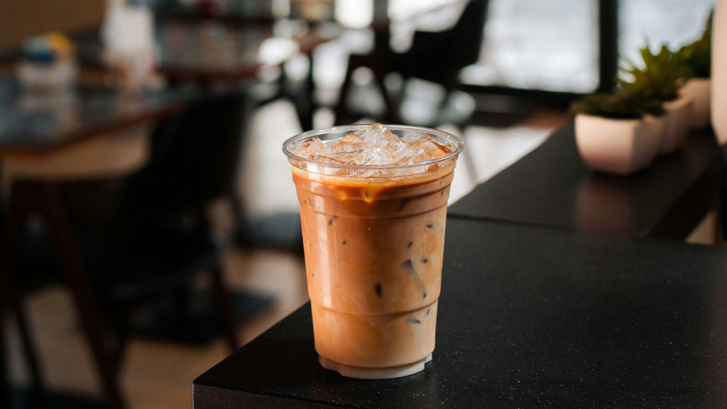 An iced coffee in a plastic beverage cup