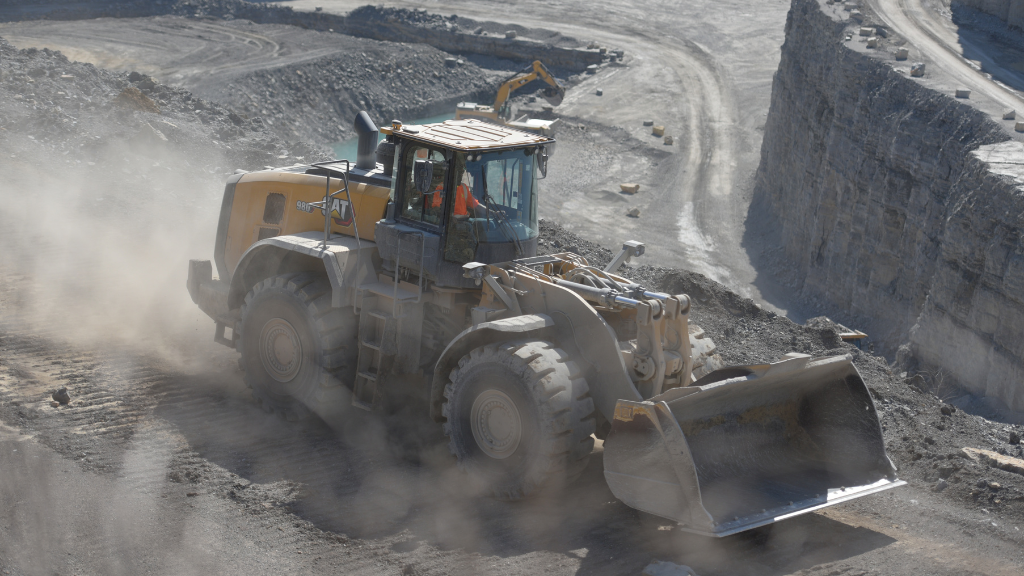 A wheel loader on an outdoor construction site A wheel loader on an outdoor construction site