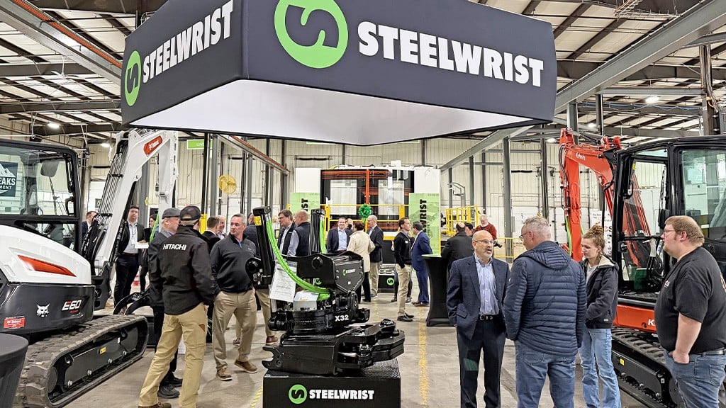 Several people at an indoor Steelwrist booth Several people at an indoor Steelwrist booth