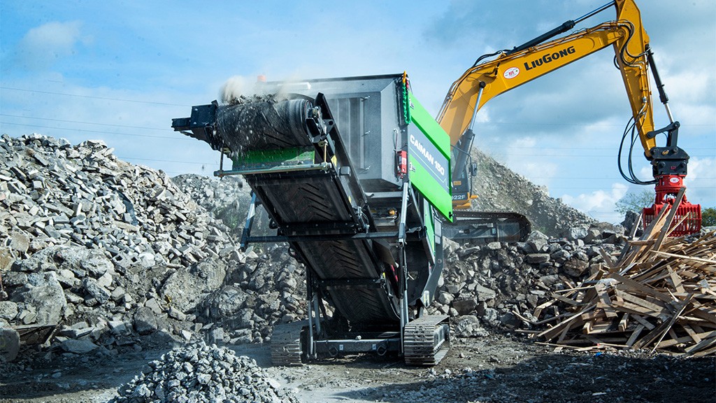 A large shredder working in an aggregate yard A large shredder working in an aggregate yard