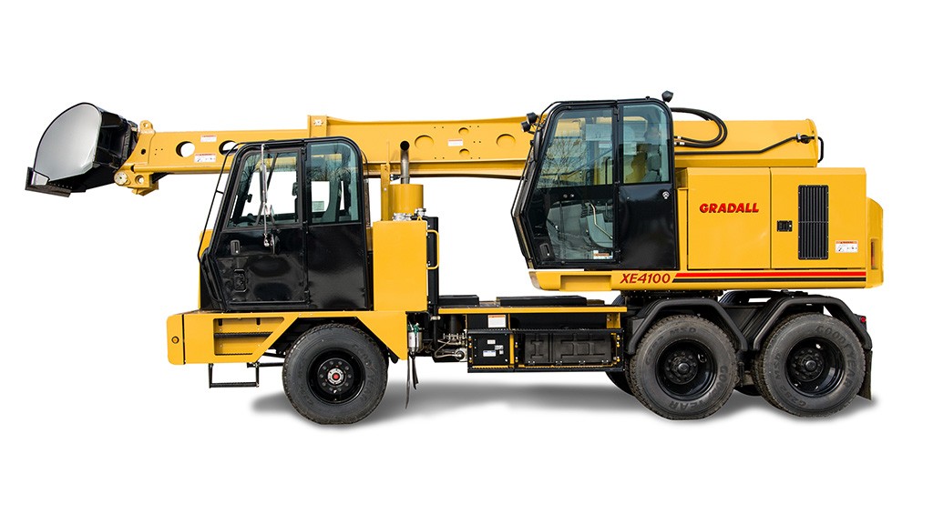 A truck-mounted excavator on a white background