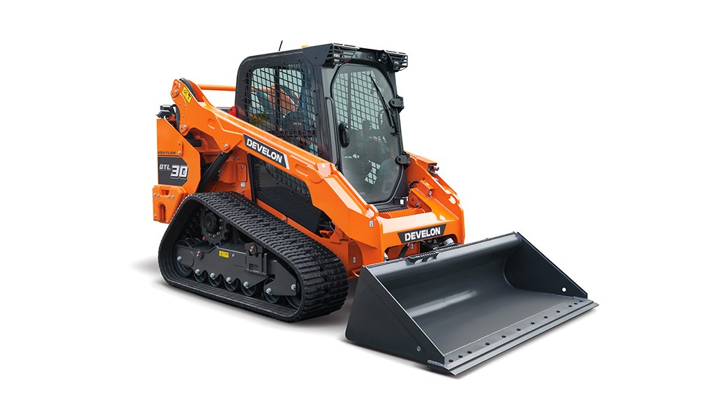 A compact track loader on a white background A compact track loader on a white background