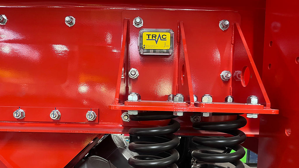 The side of a screener with a small white attachment