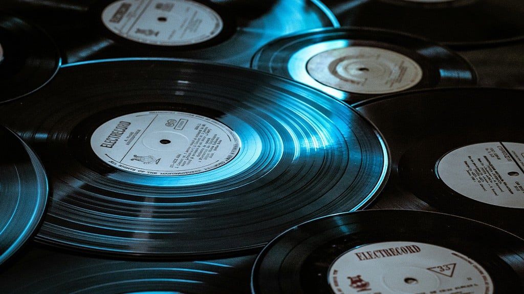 Several black vinyl records