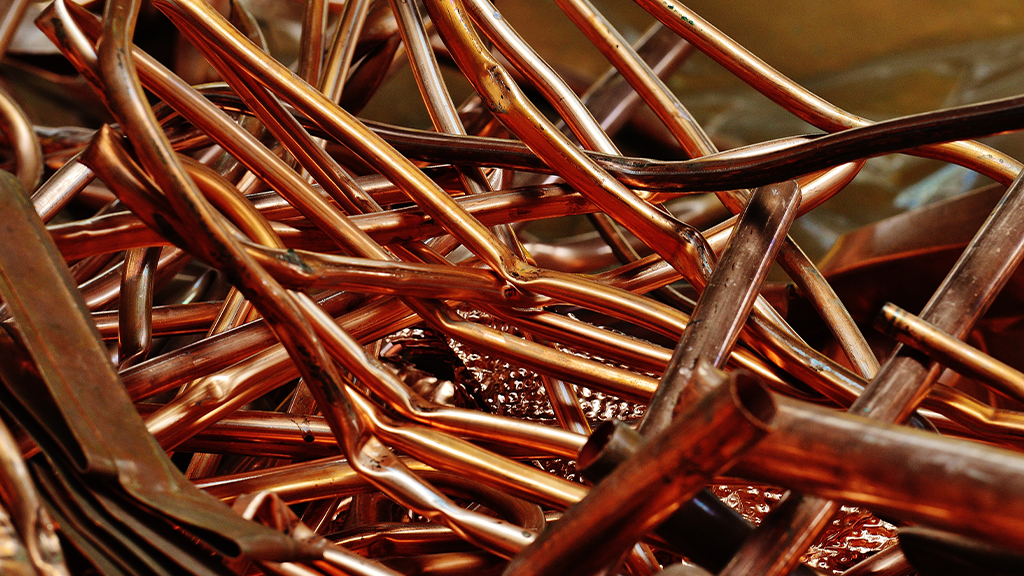 A pile of loose copper pipes A pile of loose copper pipes