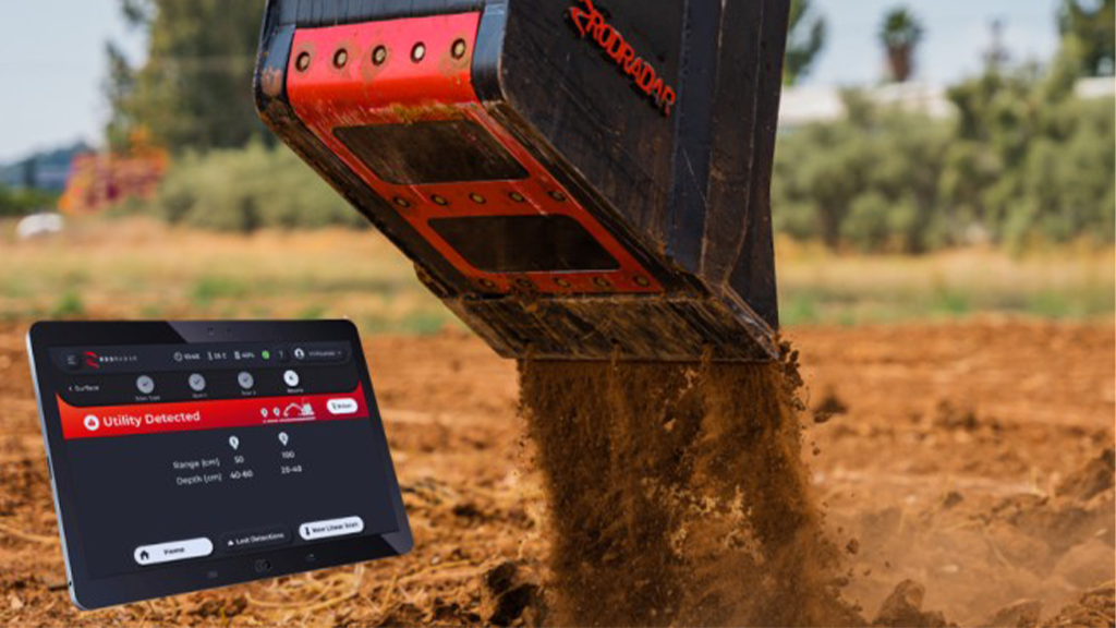 An excavator bucket with an image of a tablet