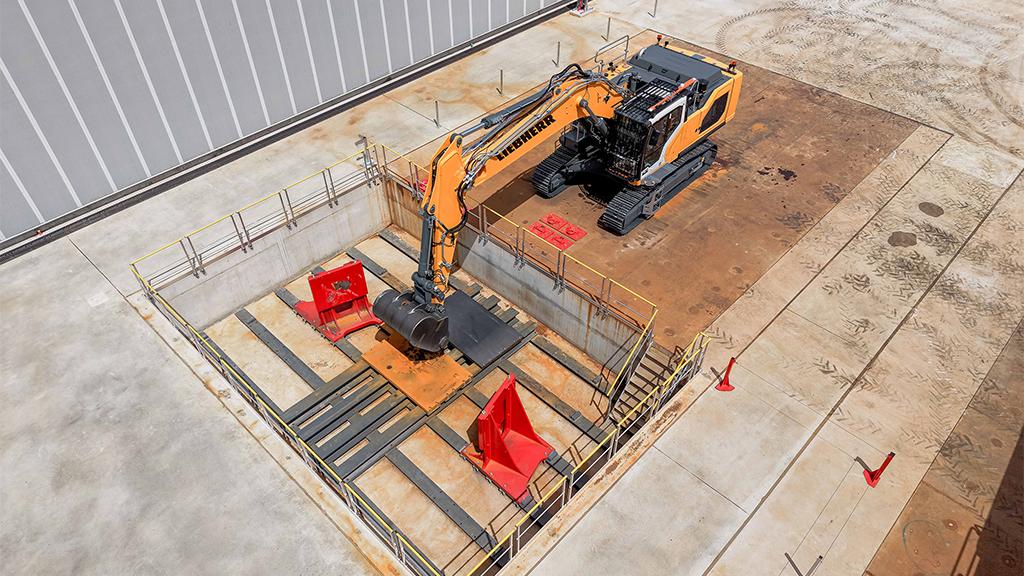 A 3D rendering of a crawler excavator in a testing site
