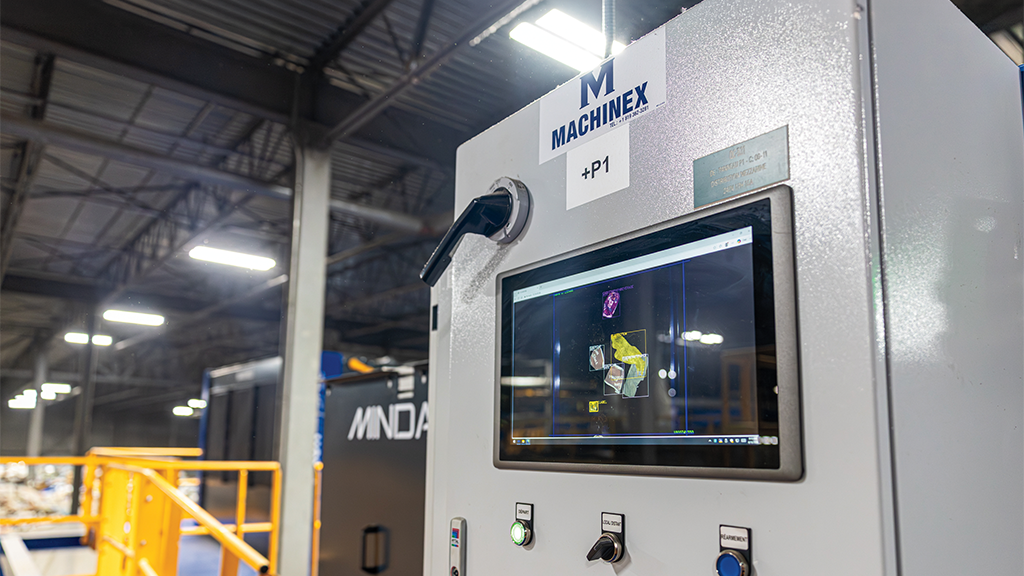 The side of a Machinex sorting machine with a digital screen The side of a Machinex sorting machine with a digital screen