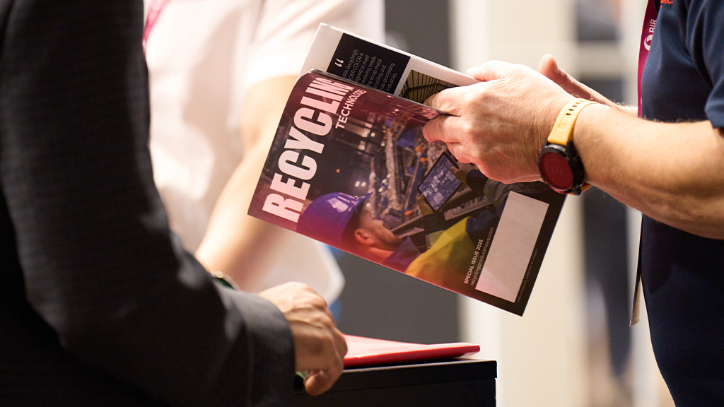 A person holds a magazine A person holds a magazine