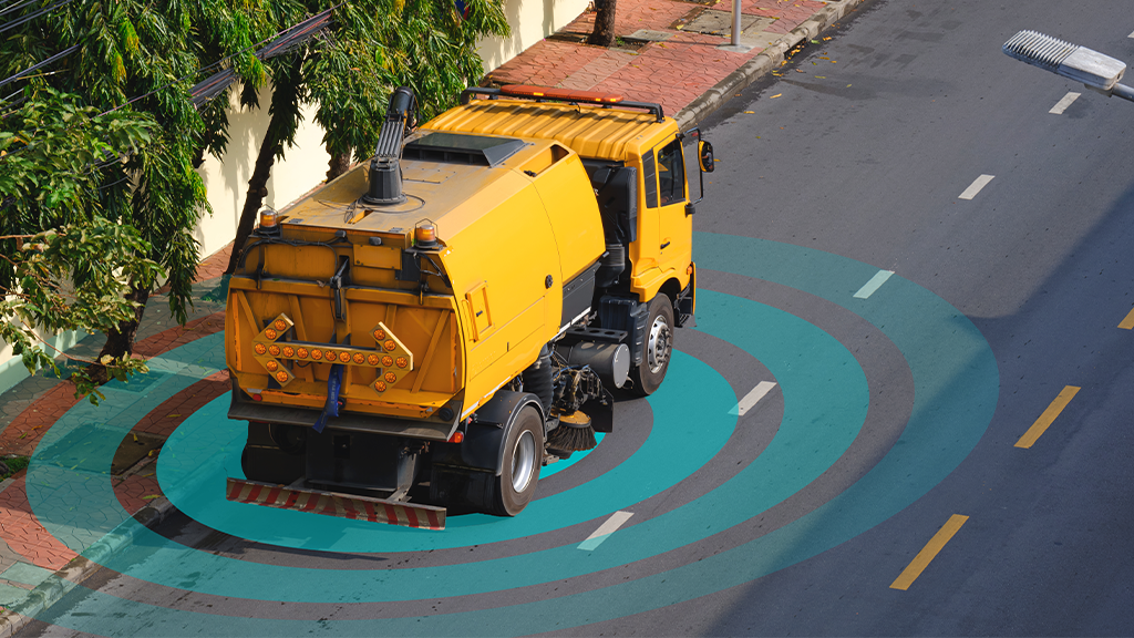 An overhead view of a street sweeper