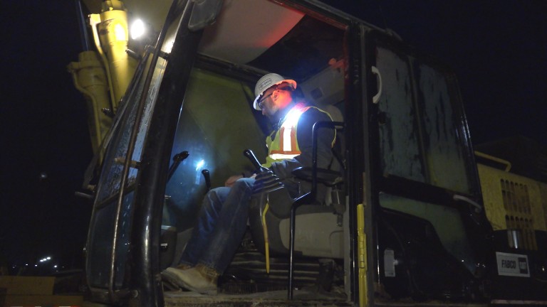 Flashlight Using Contuction Worker Wearable safety lights help prevent struck-by fatalities of road crews