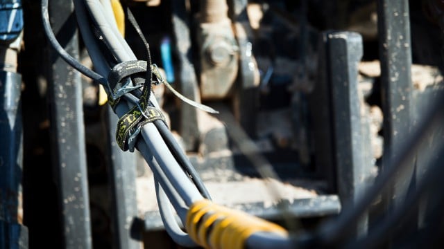 A convenient, cost-effective alternative to zip ties for fastening hydraulic hoses